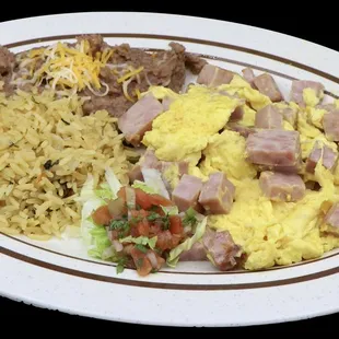 Huevos con jamón 
 Ham and eggs plate 
 Choice of flour or corn tortillas