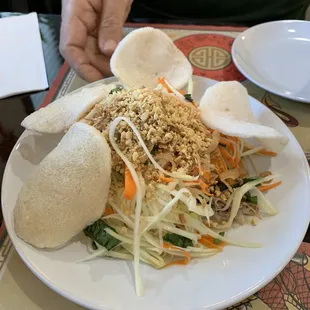 Papaya salad to start.