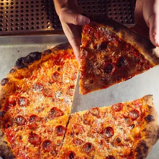 a slice of pepperoni pizza