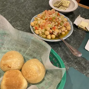 Complimentary bread and chickpeas salad