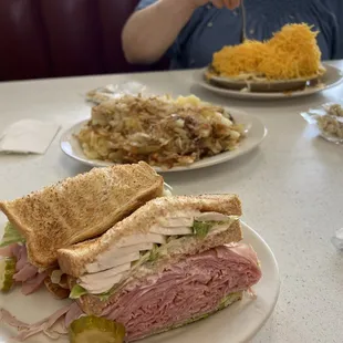 Ham and egg sandwich, Home Fries with Onion and 4 4-Way Chili