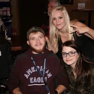 a group of friends posing for a picture