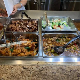 a buffet full of food