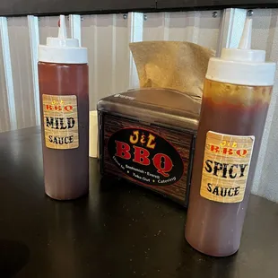 Two BBQ sauce choices at each table.