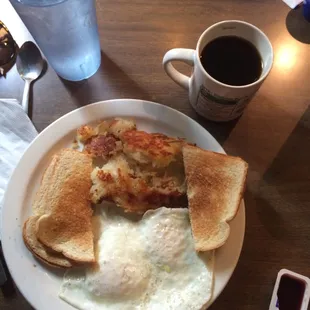 Eggs, toast, hashbrowns and coffee