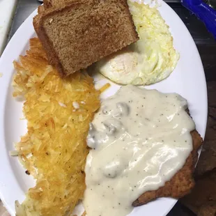 Chicken fried steak topped with creamy gravy