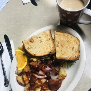Scrambled-egg breakfast sammy special with homefries and a self-serve coffee.