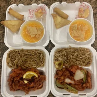 Lunch combination (left to right) of orange chicken with lo mein, and General Tao&apos;s Chicken. So much food!