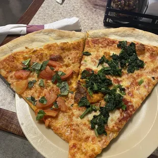 Cheese pizza with spinach, cheese pizza with tomatoes and basil