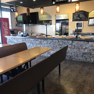 Entrance where you have all the pizzas that you can order by the slice