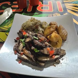 Jerk chicken with cabbage and plantains
