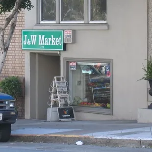 a truck parked in front of a building