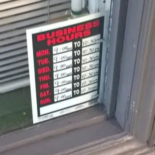 a sign in the window of a store