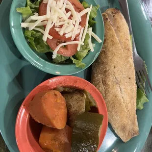 Grill snapper and salad and steamed vegetables