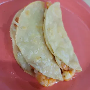 I love the Shrimp quesadilla. The stewed vegetables are wonderful not spicy