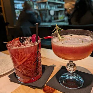 two cocktails on a table