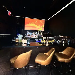  a bar with a large screen