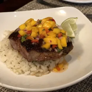 Sword fish, with a mango salsa over rice.