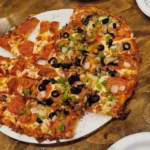 We attack the pizza before I remember to take a picture of it. Half pepperoni the other half was supreme