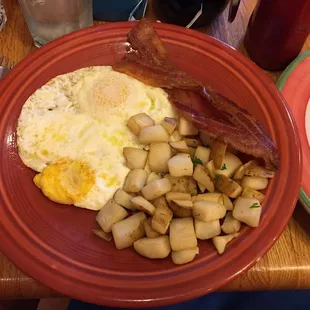 Pantry Feast - over medium eggs, potatoes and bacon