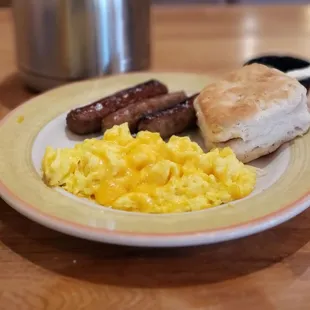 Scrambled eggs w/cheese, pork sausage and biscuit