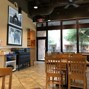 Part of the dining room and the door leading to outdoor side patio.