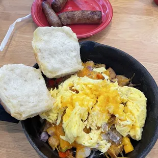 Sausage and gravy skillet with a side of sausage links.