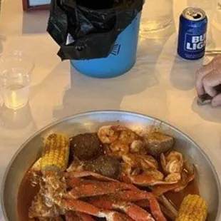 2 pounds of snow crab legs, one pound of shrimp, 3 half potatoes, and 3 pieces of corn, all in the restaurants sauce (only option).