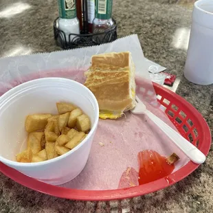 Bacon egg and cheese with home fries