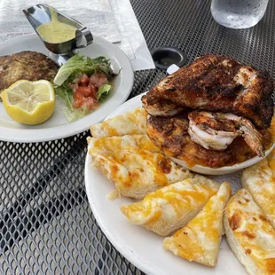 The Buddy Bowl with catfish, scallops, and shrimp, and a crab cake.