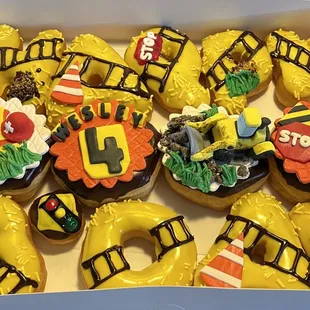 a box of decorated doughnuts