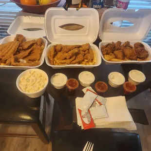 Fish. Shrimp. And oysters with a bed of fries. Oh yeah don&apos;t forget the macaroni salad.
