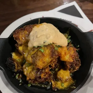 House made brisket tots with jalapeño honey aioli