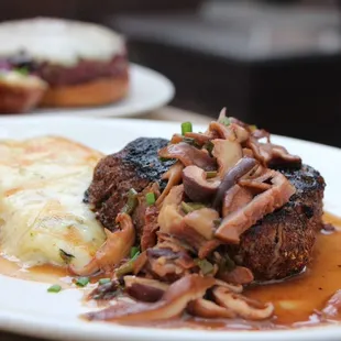 a plate of meat and vegetables