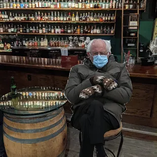 a man wearing a face mask and gloves