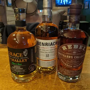 three bottles of whiskey