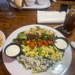 Cobb salad with no avocado and a side of fries such great presentation and it's always delicious