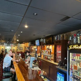 a man sitting at a bar