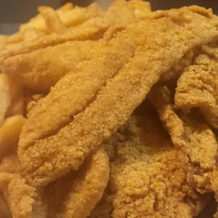 Fried red snapper, greens, Mac,  hush puppies.