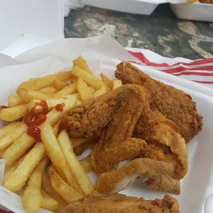 Fried Chicken (wing, drumstick and thigh), French fries,  coleslaw, bread and a drink.
