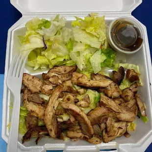 Chicken Teriyaki rice plate w/ sautéed cabbage, salad and sauce on the side. 01.12.23