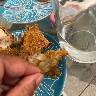 Overly thick cornmeal crust on fish dinner (only beer batter should be a crust)