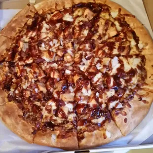 Their BBQ Chicken Pizza has bacon!