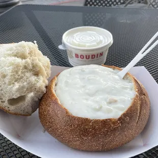 a bowl of soup in a bread bowl