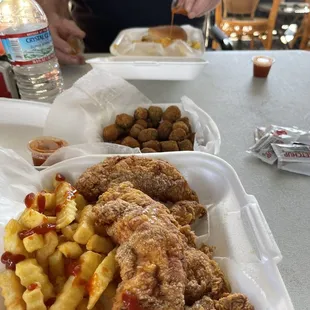 YThree chicken tenders w/fries