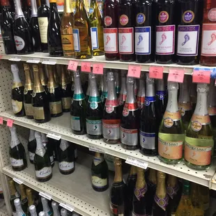 a variety of wines on shelves