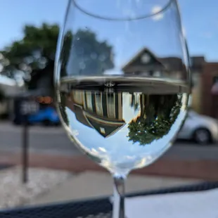 a glass of wine on a table