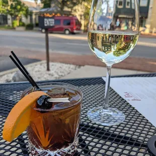 a glass of wine and a drink