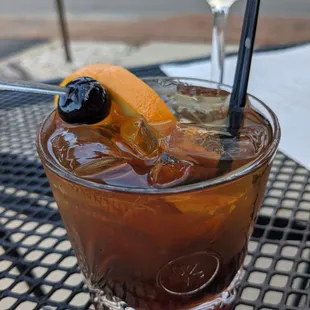a drink with a garnish