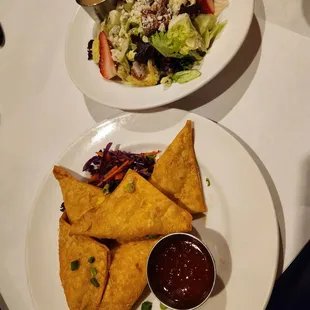 CRAB RANGOONS (5) HAND-FOLDED WONTONS FILLED WITH CRAB MEAT, ONIONS, CARROTS, CELERY, AND CREAM CHEESE FRIED